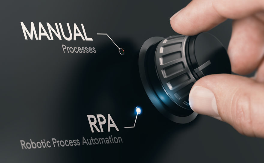 Fingers on a dial moving from Manual to RPA (automation)